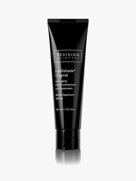 Revision Skincare Intellishade Tinted Moisturizer SPF 45: A black sunscreen tube with white text on a light grey background